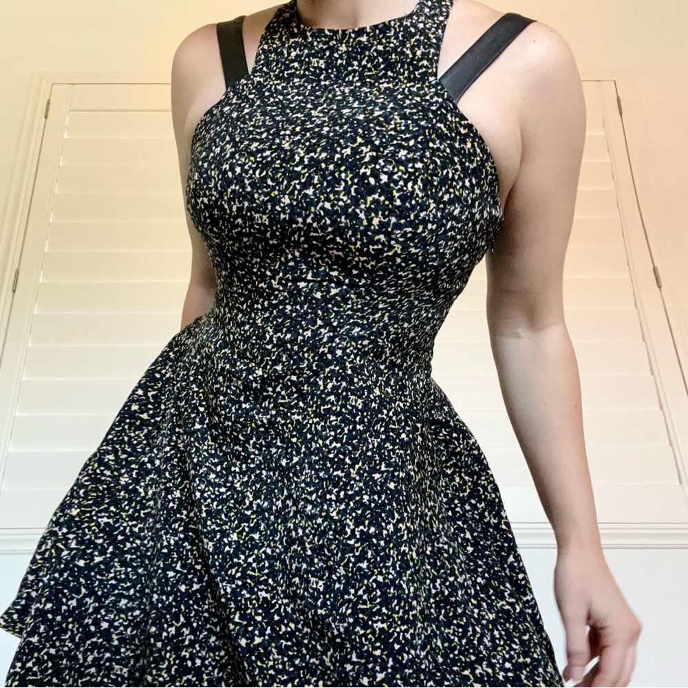 BCBGeneration Black and White strappy leather cutout mini Cocktail Dress